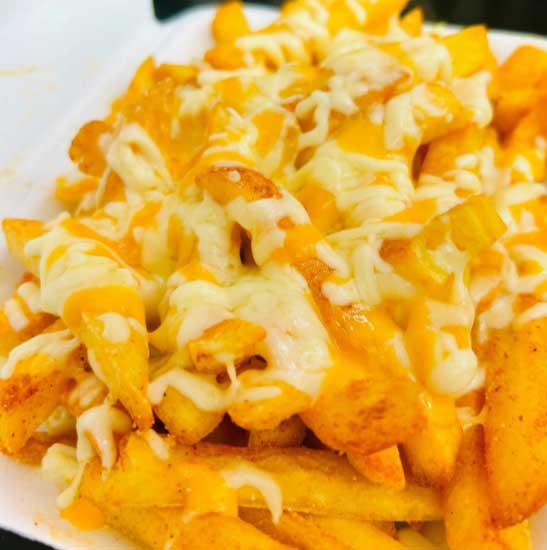 Vinnie’s Pizzeria thick-cut chips covered in an amount of melted cheddar and white cheese sauce.